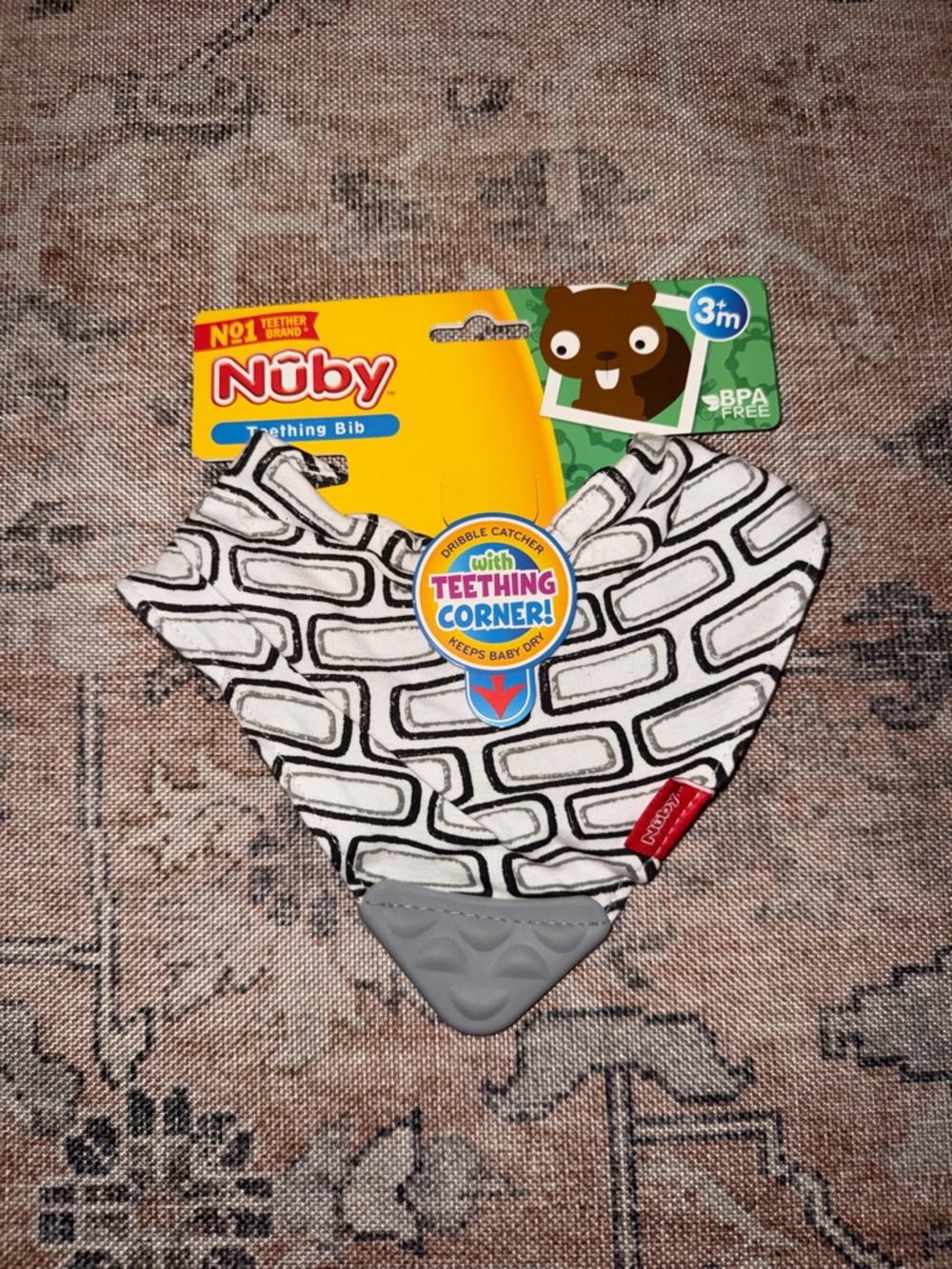 Brand new Nuby Teething Bib in Black & White with Teething Corner